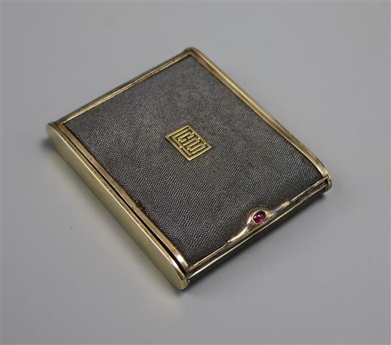 A shagreen and gilt metal cigarette case by Cartier,